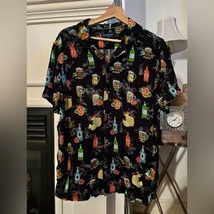 Men’s themed button down top